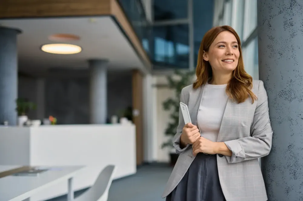Professional in an office lobby kept pest-free with discreet recurring service