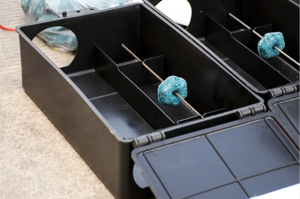 Tamper-resistant rodent bait station mapped and monitored for warehouse audits